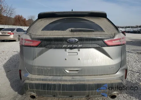 2021 Ford Edge Titanium z USA, uszkodzony, nr VIN 2FMPK4K97MBA27143